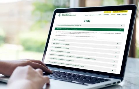 Responsive Website Design - FAQ's Page on Laptop - St Patrick’s Boys’ National School